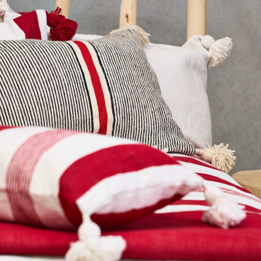 Cushion Cotton with Pom Poms 60x40cms red stripe